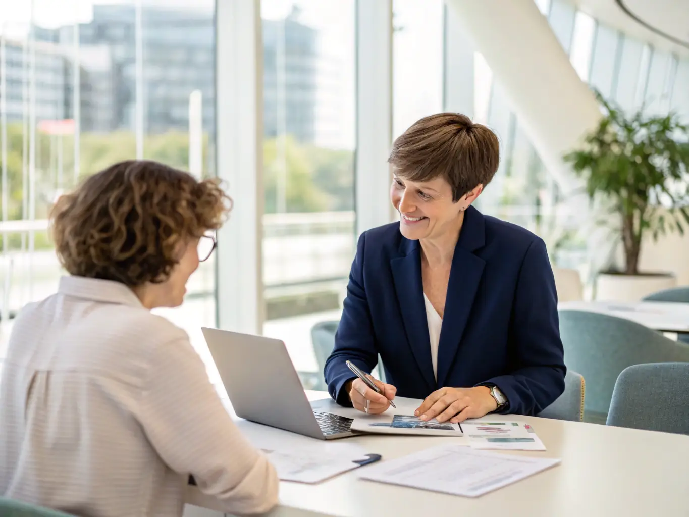 A consultant from Dawn of Bosa is sitting at a desk, reviewing financial documents with a client in a modern office setting. The scene conveys trust and expertise.